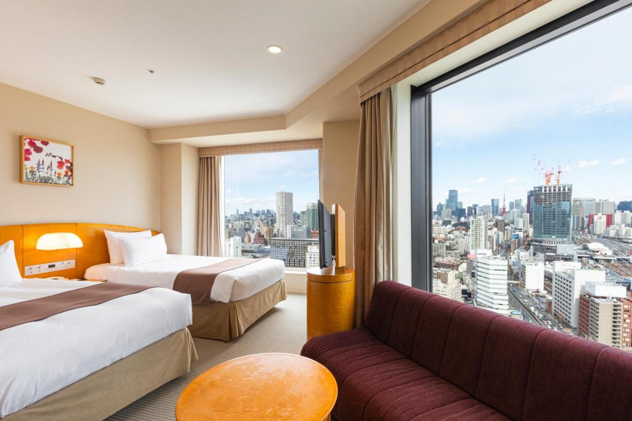 Quarto de canto com 2 camas de solteiro - Torre principal entre o 30º e o 34º andar - Não fumantes
